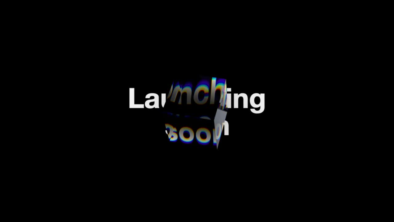 Ein Video mit dem Text "Launching soon" (bald erhältlich) und einem klaren Würfel, der sich über dem Text bewegt